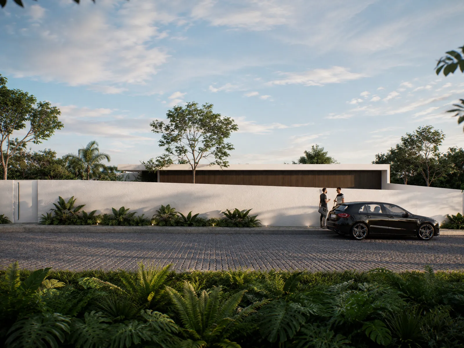 Casa moderna con muros blancos y garaje, parqueadero pavimentado, personas junto a automóvil negro y vegetación tropical.